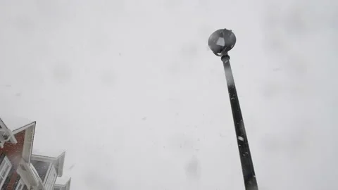 Snow falling on the camera lens Stock Footage 149385071