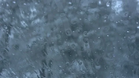 Snow falling onto car window Stock Footage 145991107