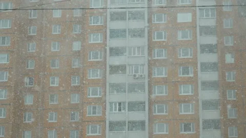 Snow falling in city, winter background. Snowstorm, snowy weather. Stock Footage 102720094