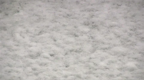 Snow falling on concrete path and sticking Video stock 35070339