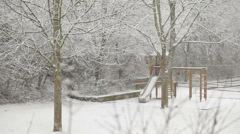 Snow falling in the courtyard with a playground. Stock Footage 48437620