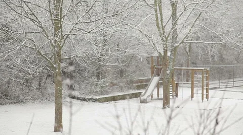 Snow falling in the courtyard with a playground. 動画素材 48446993