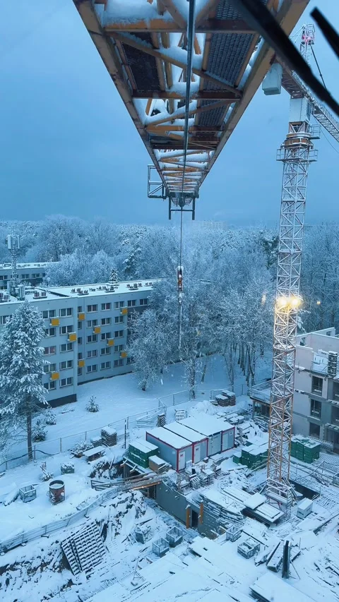 Snow Falling from Crane Trolley During Winter Movement Stock Footage 307436832