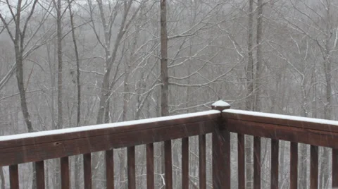 Snow Falling on a Deck Guardrail Stock Footage 35174027