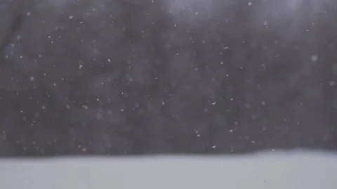 Snow falling dots background Slow motion video Stock Footage 98489788
