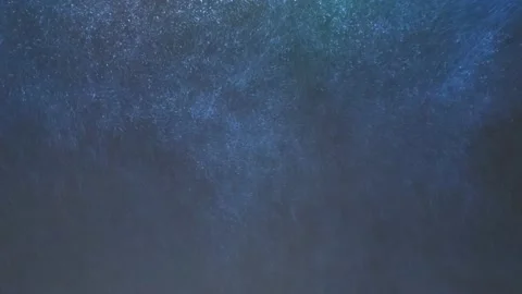 Snow falling down in the light of street lamp. Calm evening time in the city Stock Footage 147223977