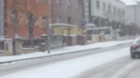 Snow falling down from the sky on the road Video stock 59700377