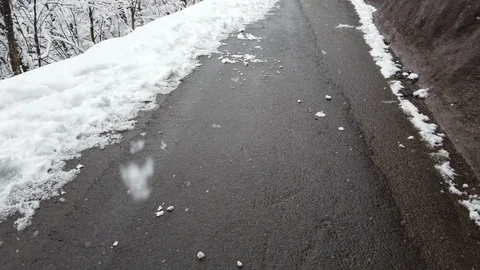 Snow falling on footpath in winter Stock Footage 107780543