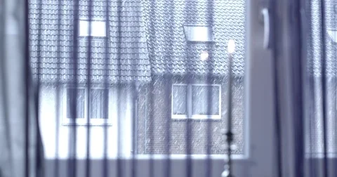 Snow Falling In Front Of a window Stock Footage 84774888
