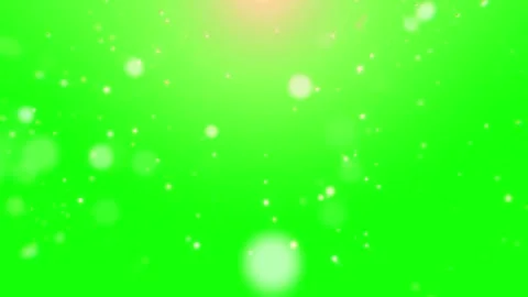 Snow falling on green screen with warm light Видео 337924142