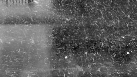 Snow falling heavily on the road Stock Footage 235556847