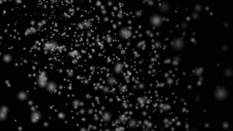 Snow is falling from left to right side. CGI Overlay of snowflake isolated on Bl Stock Footage 142994590
