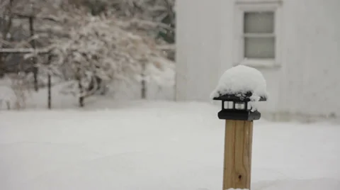 Snow falling on Light Stock Footage 34585454