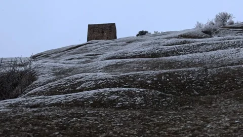 Snow Falling on Monastery Castle Walls in the Mountains Stock Footage 238823367