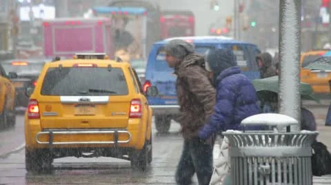 Snow falling in New York City crowd walking slow motion 25p Stock Footage