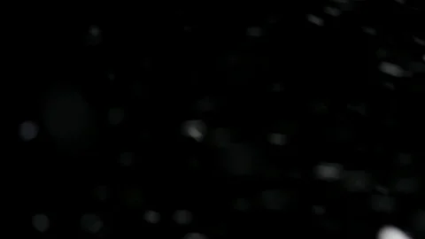 Snow falling at night close to a lamp - Artistic background Stock Footage 129406683