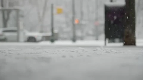 Snow Falling on NYC Sidewalk Stock Footage 330974034