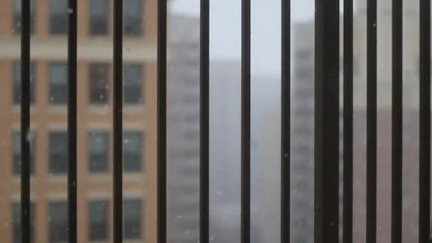 Snow falling outside window Stock Footage 89047648