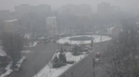 Snow falling over the city Stock Footage 11415888