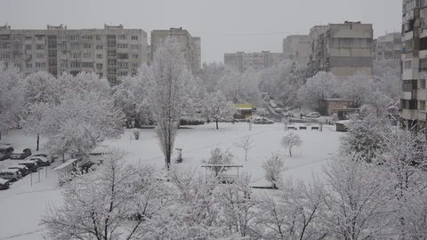 Snow is falling over the city. Stock Footage 98981080