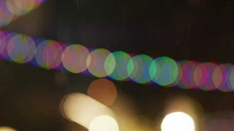 Snow Falling Over Street Lamp Christmas Lights Stock Footage 100545558