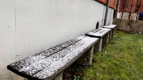 Snow Falling on Park Benches Stock Footage 99534326
