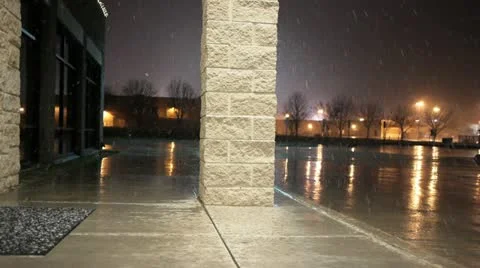 Snow falling in parking lot 4 Video stock 10886322