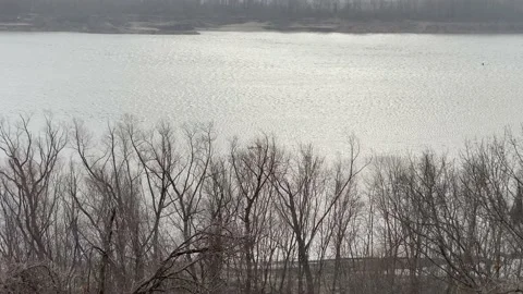 Snow Falling on the River Stock Footage 146654205