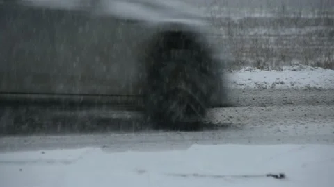 Snow falling on road. Snowstorm in winter season Stock Footage 144473640