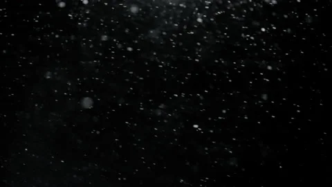 Snow falling sideways to the right in fr... | Stock Video | Pond5