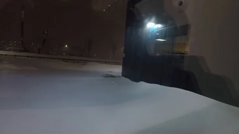 Snow falling on stormy winter night Stock Footage 122193511