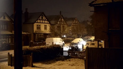 Snow falling on streets of Epsom, Surrey, Uk at night, winter scenic. Febr. 2018 Stock Footage 103587806