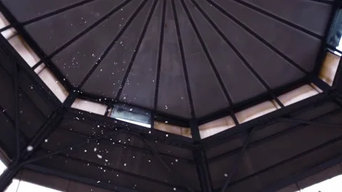 Snow Falling Through Open Roof Window Stock Footage 327795630