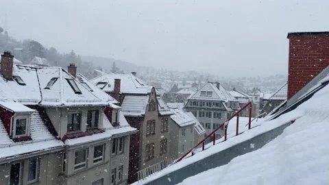Snow falling in winter in City. Winter in Stuttgart, Germany. View over Stock Footage 149091506