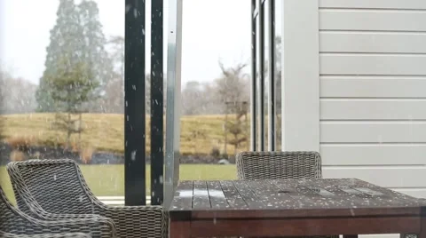 Snow falling on Wooden table Wide Shot Stock Footage 52360694
