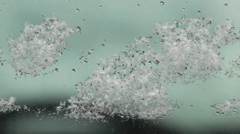 Snow falling,macro snowflakes falling on the window,close up shot Video stock 34448659