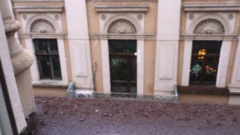 Snow falls and melts on the window, 4k video 動画素材 124268324