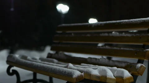 Snow Falls On The Bench Stock Footage 58525621