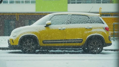 Snow falls on the car Stock Footage 83247458