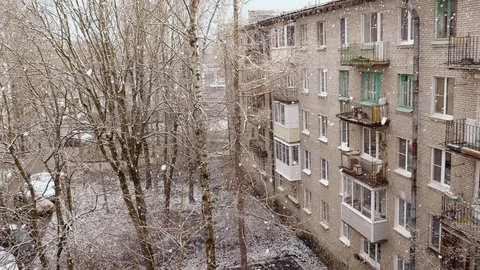 Snow falls in the city Stock Footage 108745760