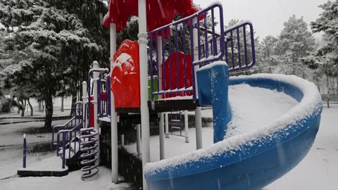Snow Falls On The Playground 1 Stock Footage 225836082