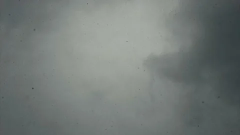Snow falls from the sky from the clouds view from the bottom up snowflakes fly Видео 175911859