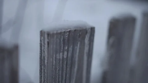 Snow on a fence Stock Footage 87989107