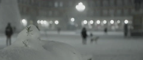 Snow figure with defocused city in the background Stock Footage 148388341