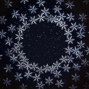 Snow flakes on dark background. Round frame made of snowflakes, place for tex Stock Photos