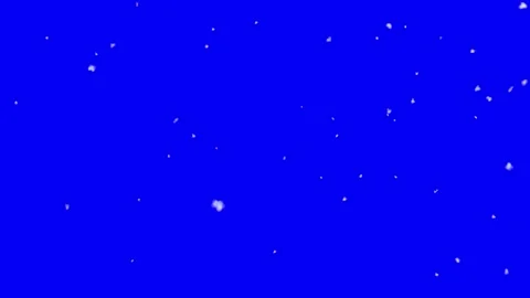 Snow flakes falling in front of blue screen Stock Footage 252512811