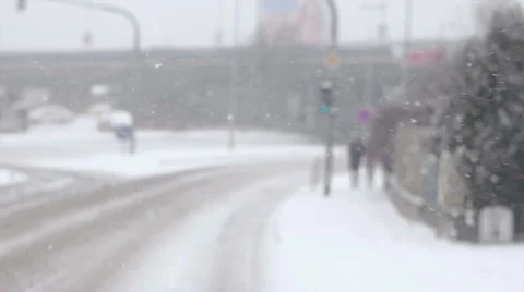 Snow flakes layering down on the city road Stock Footage 59700459