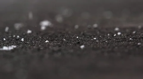 Snow flakes on tar ground Stock Footage 53206750