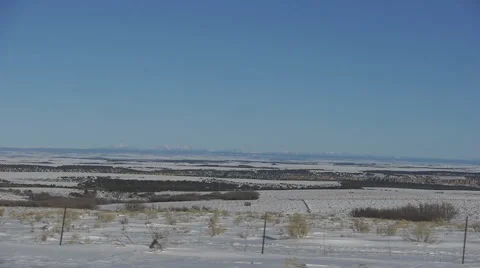 Snow flat desert view from driving vehicle on the road Stock Footage 47569959
