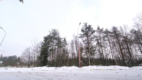 Snow flies into the windshield of the car Stock Footage 86194177